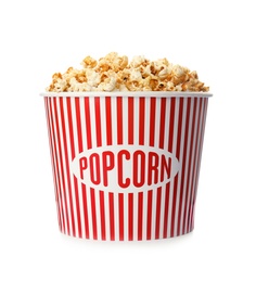 Photo of Carton bucket with delicious fresh popcorn on white background