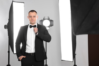 Handsome model posing in studio. Professional photo session