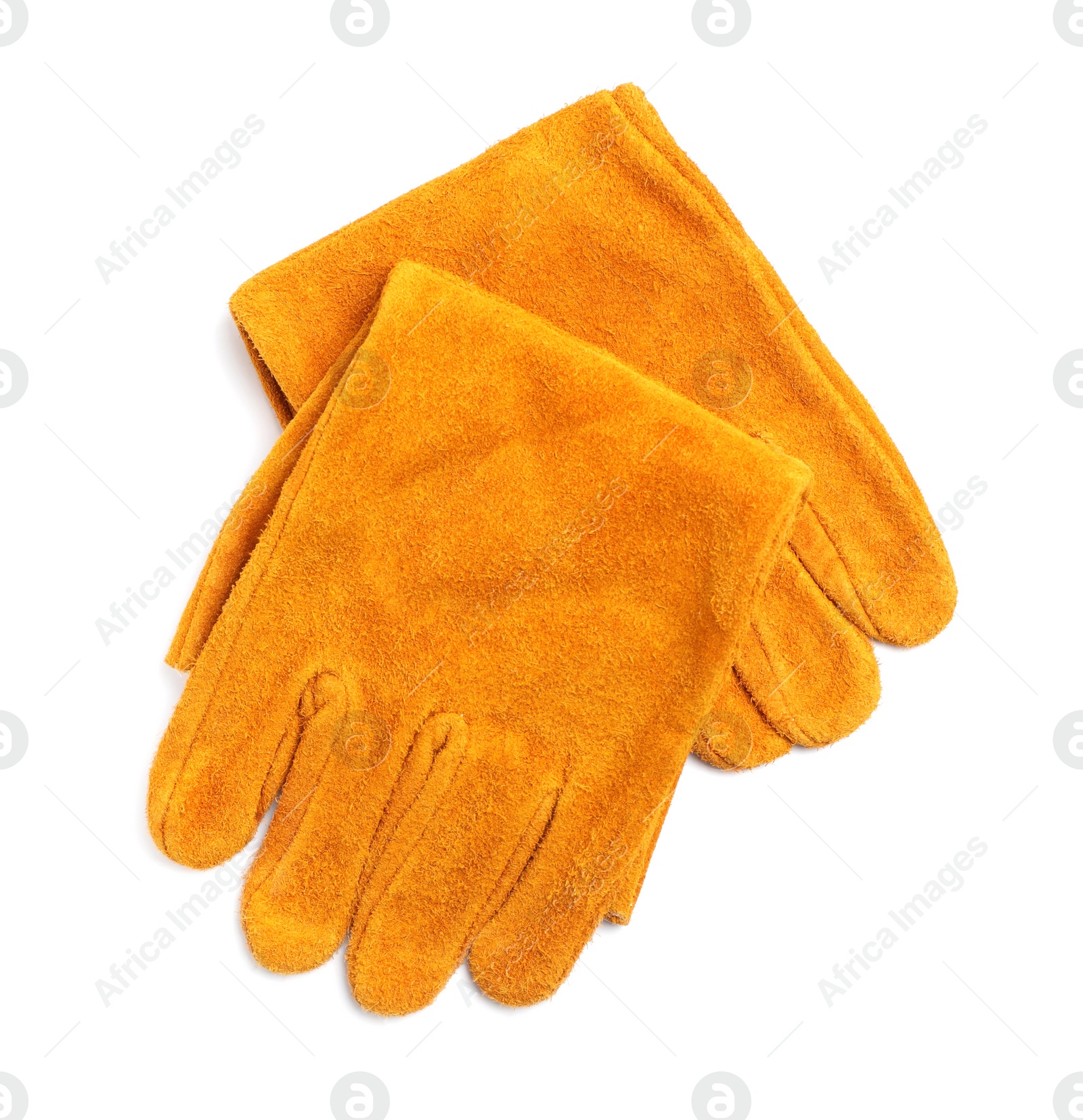 Photo of Orange protective gloves on white background, top view. Safety equipment