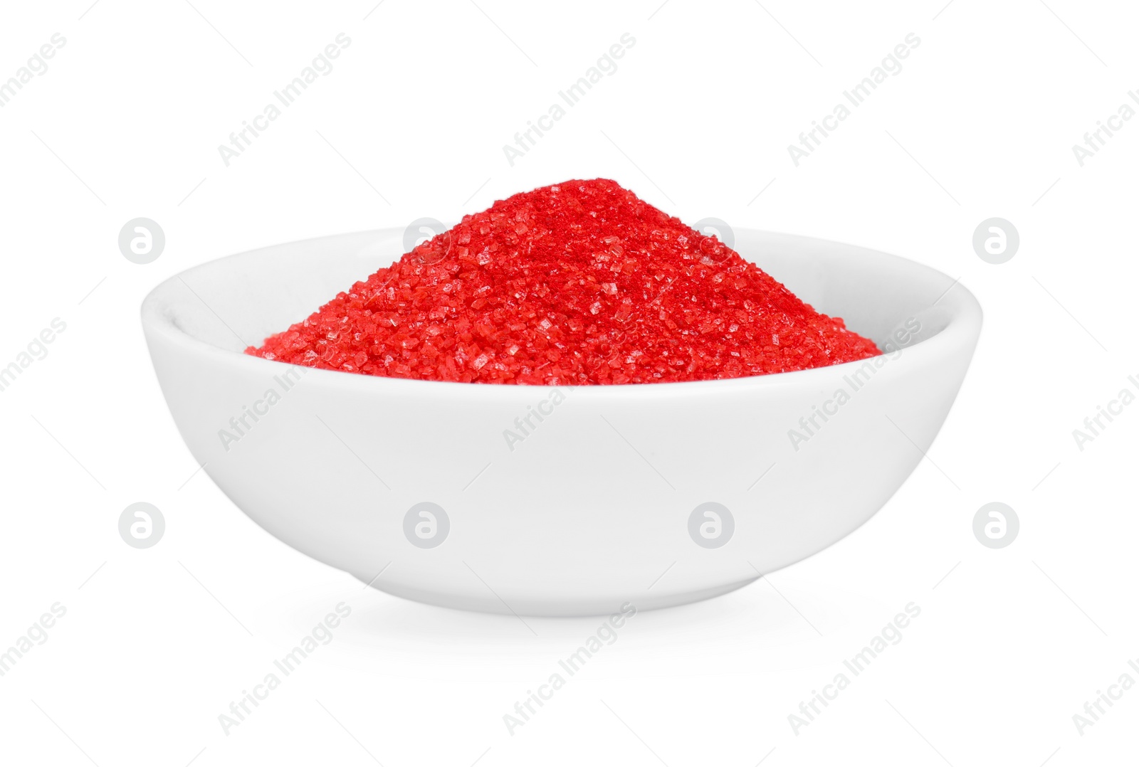 Photo of Bowl with red food coloring isolated on white