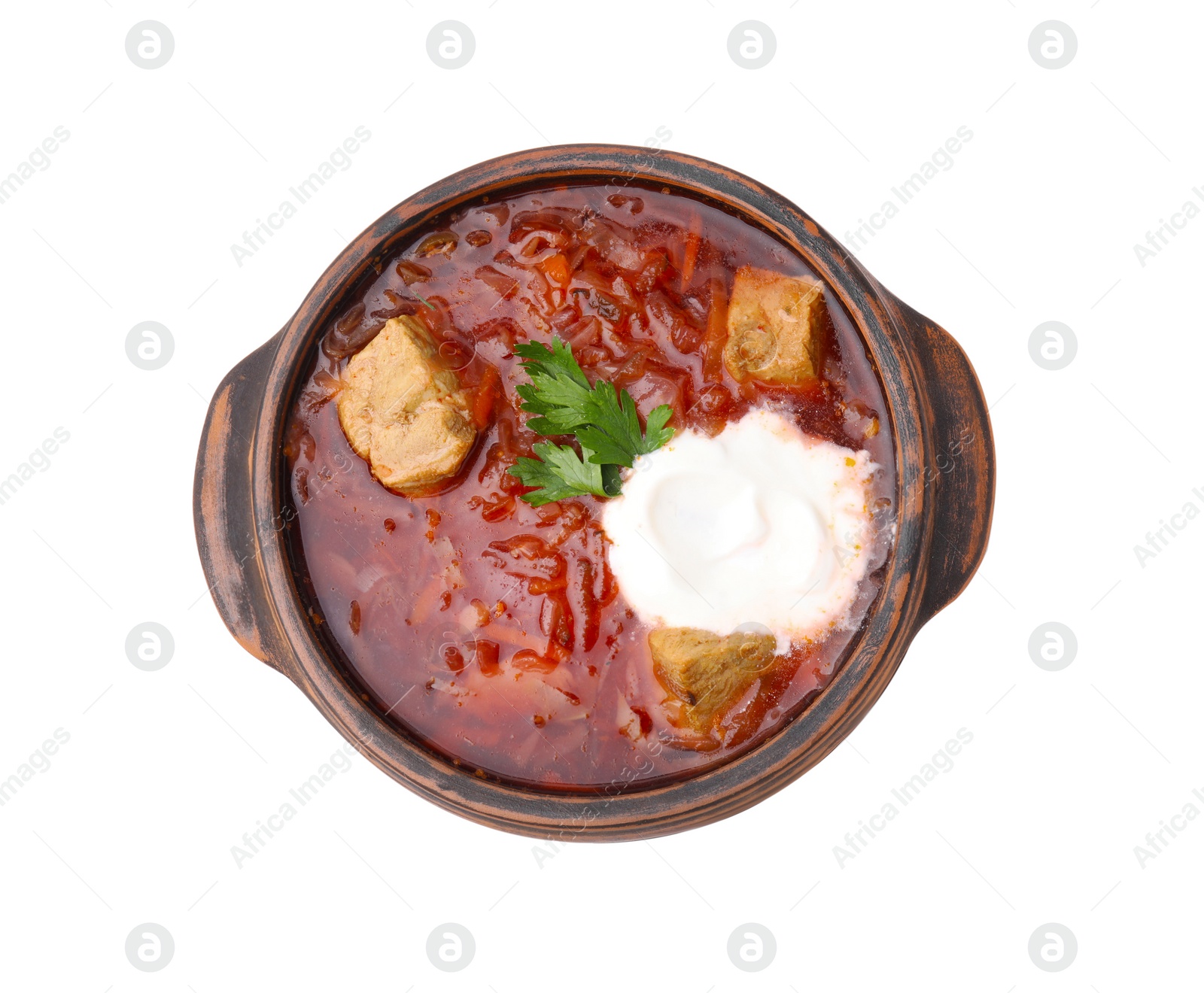 Photo of Tasty borscht with sour cream in bowl isolated on white, top view