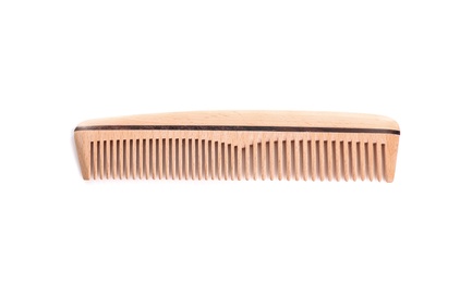 Photo of New wooden hair comb on white background, top view