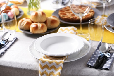 Photo of Festive Easter table setting with traditional meal