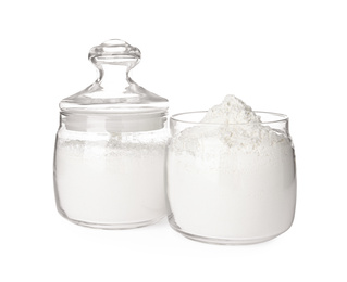 Photo of Organic flour in glass jars isolated on white