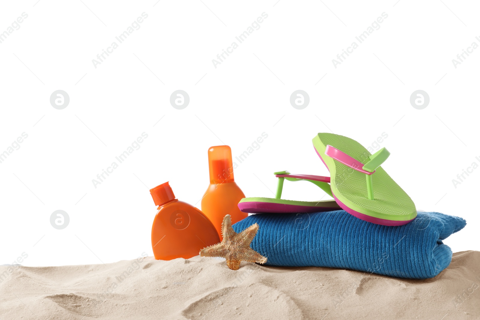 Photo of Composition with beach objects on sand against white background