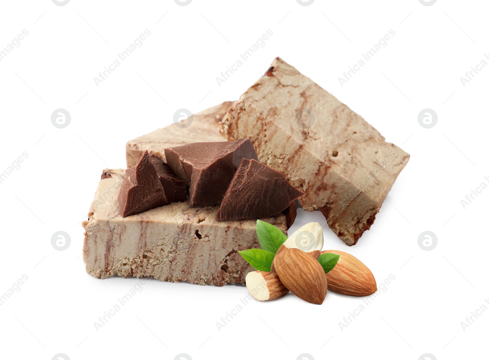 Image of Tasty halva, almonds, pieces of chocolate and green leaves isolated on white