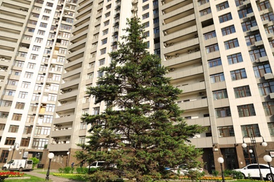 KYIV, UKRAINE - MAY 21, 2019: Beautiful view of modern housing estate in Pecherskyi district on sunny day