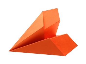 Photo of Handmade orange paper plane isolated on white