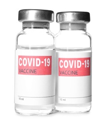 Photo of Vials with vaccine against coronavirus on white background