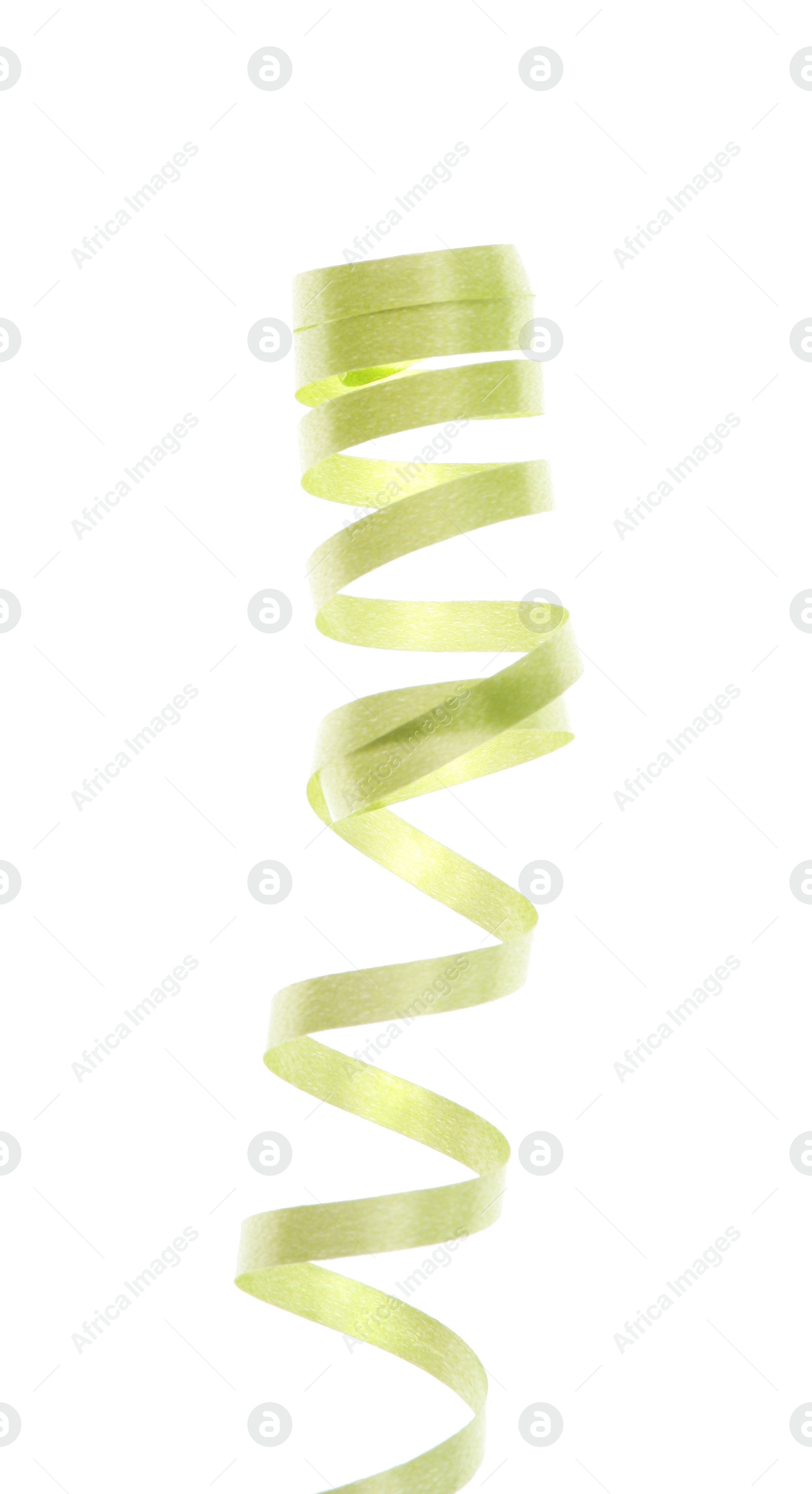 Photo of Bright serpentine streamer on white background. Festive decor