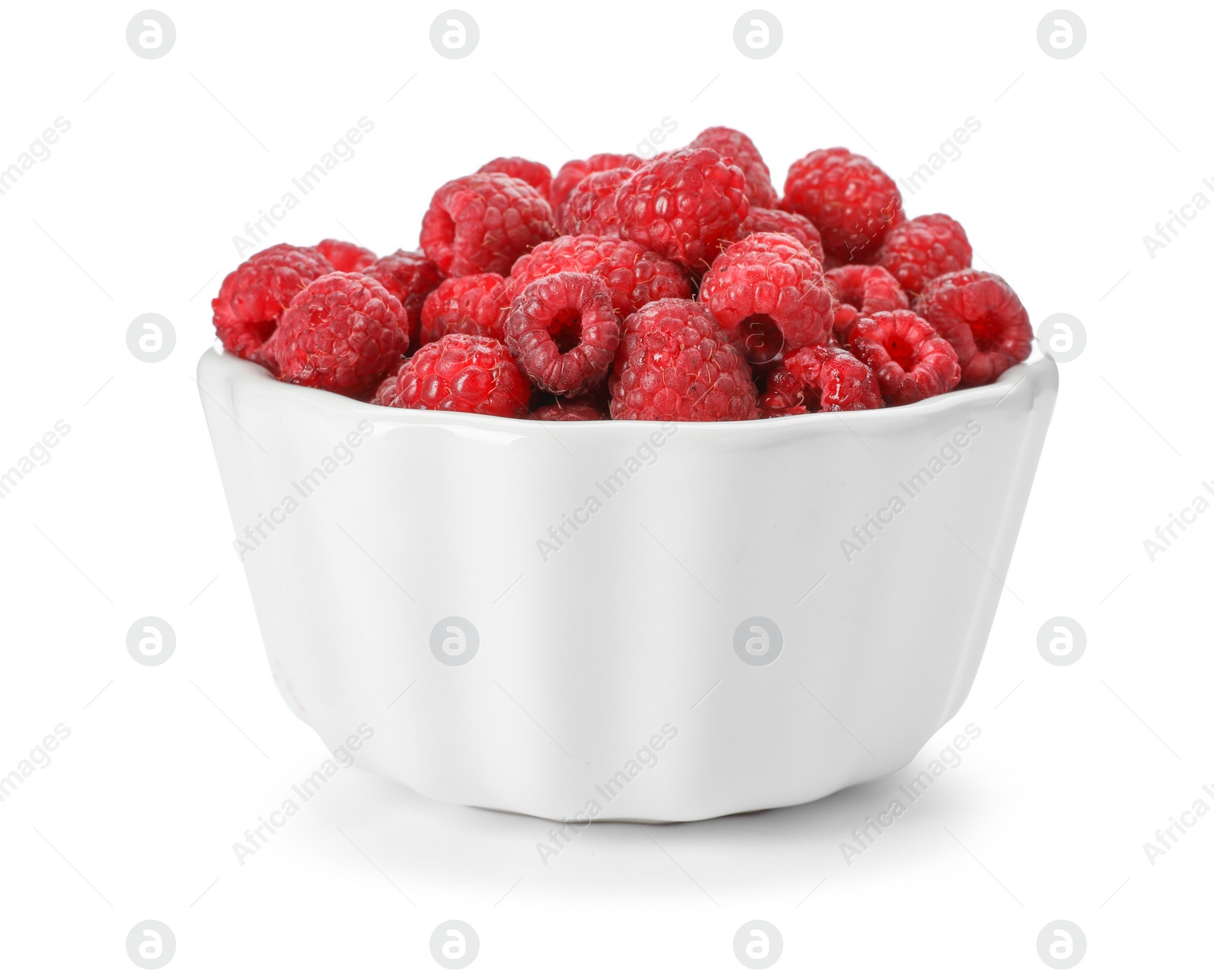 Photo of Bowl with ripe raspberries on white background