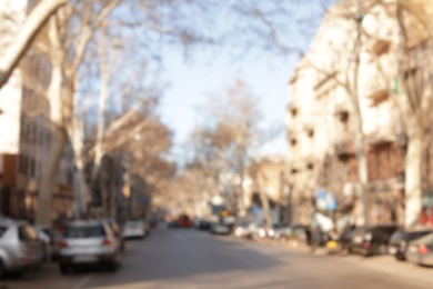 Photo of Blurred view of city street on sunny day