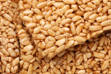 Photo of Puffed rice bars (kozinaki) as background, top view