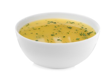 Photo of Bowl with lemon sauce on white background. Delicious salad dressing