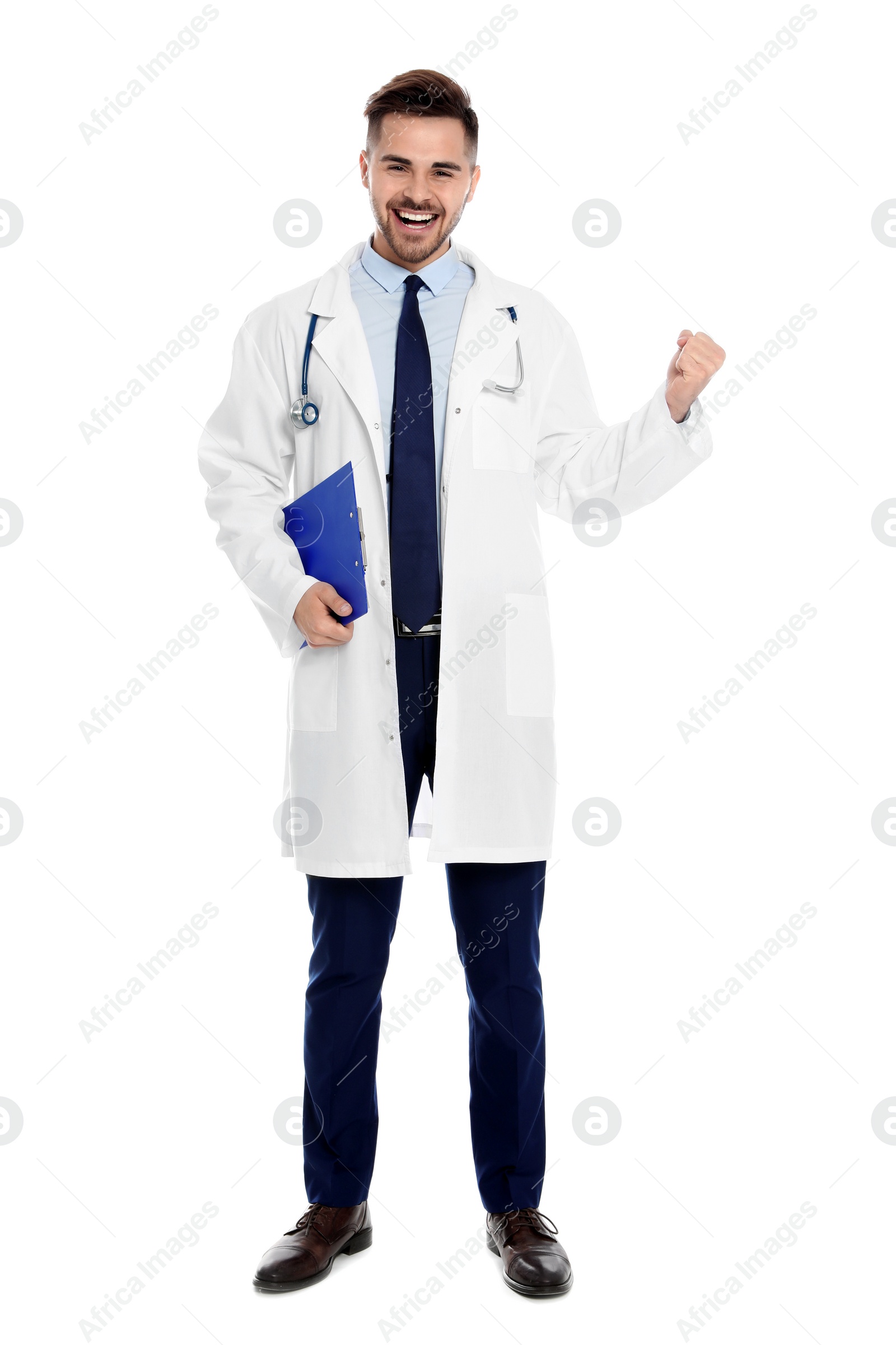 Photo of Full length portrait of emotional medical doctor with clipboard and stethoscope isolated on white