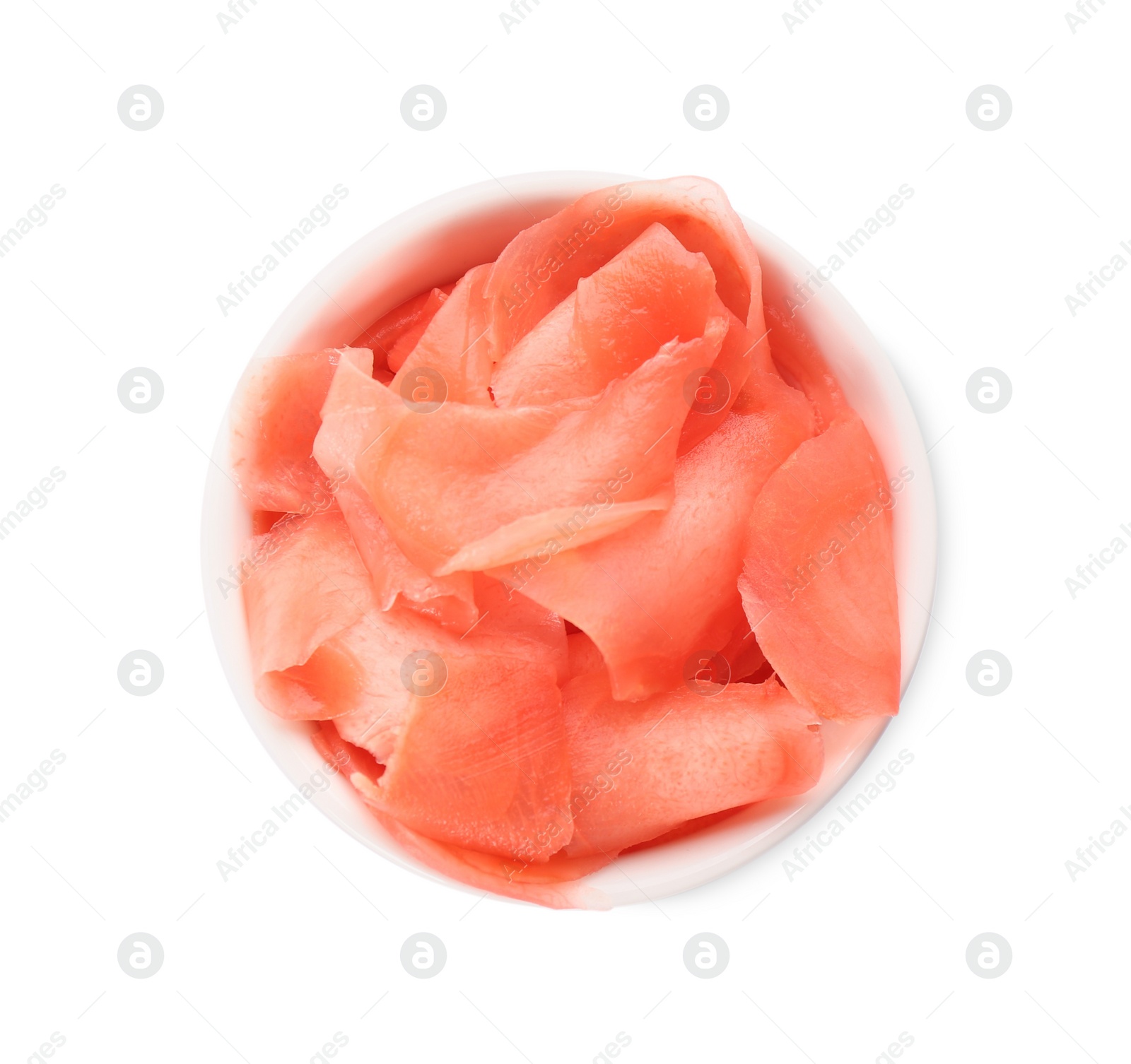 Photo of Pickled ginger in bowl isolated on white, top view