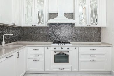 Beautiful kitchen interior with new stylish furniture