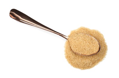 Photo of Pile of brown sugar and spoon isolated on white, top view