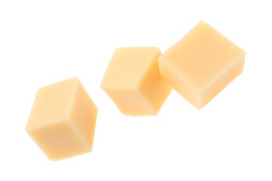 Photo of Cubes of tasty cheese isolated on white