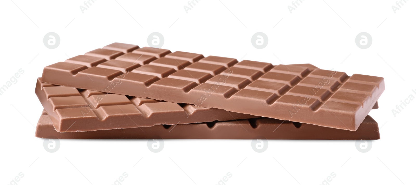Photo of Delicious milk chocolate bars isolated on white