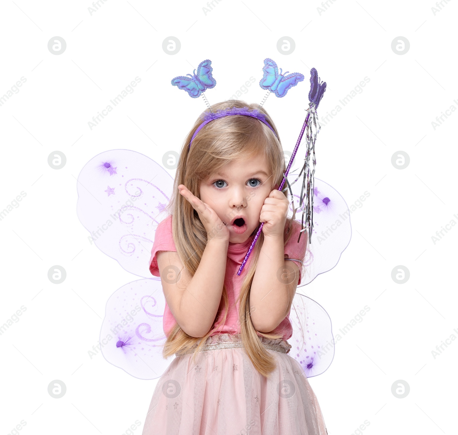 Photo of Surprised little girl in fairy costume with violet wings and magic wand on white background