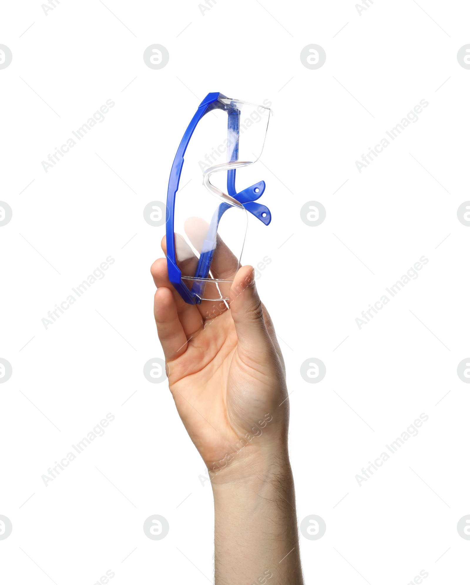 Photo of Man holding protective goggles isolated on white, closeup