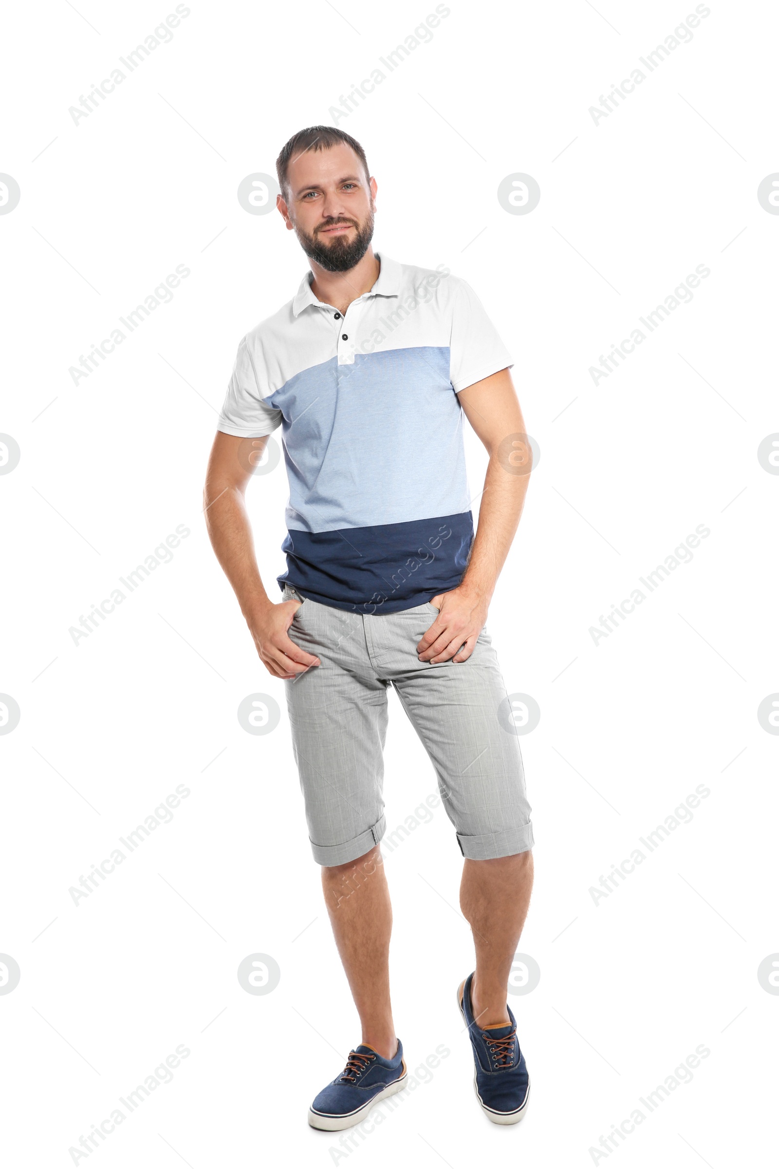 Photo of Full length portrait of man in casual clothes on white background