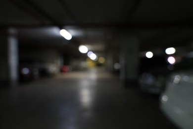 Photo of Blurred view of car parking garage at night