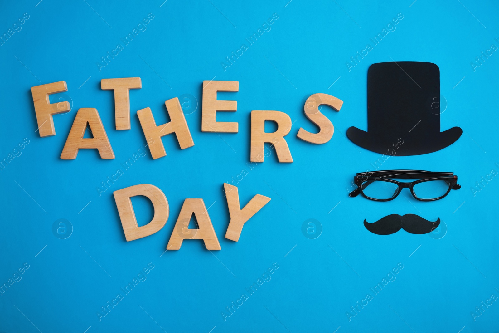 Photo of Flat lay composition with paper decor and glasses on color background. Happy Father's Day