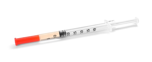 Photo of Syringe on white background. Medical treatment