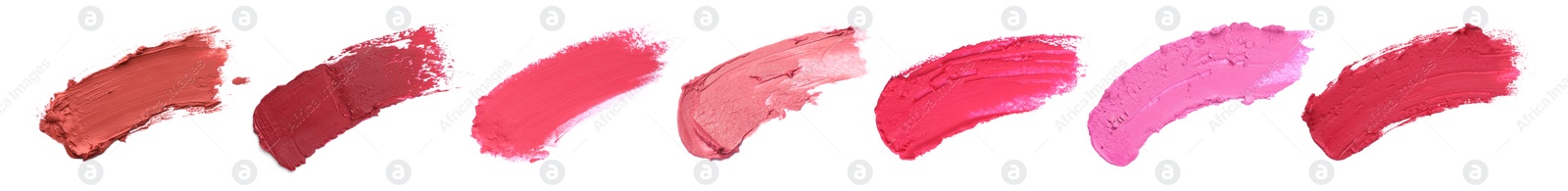 Image of Smears of different beautiful lipsticks on white background, top view. Banner design