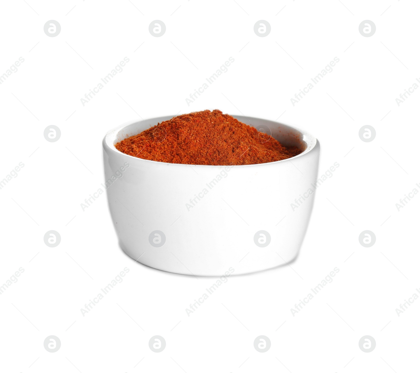 Photo of Bowl of ground pepper isolated on white