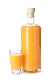Bottle and shot glass with tasty tangerine liqueur isolated on white