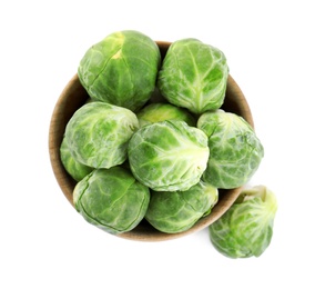 Photo of Fresh Brussels sprouts in bowl isolated on white, top view