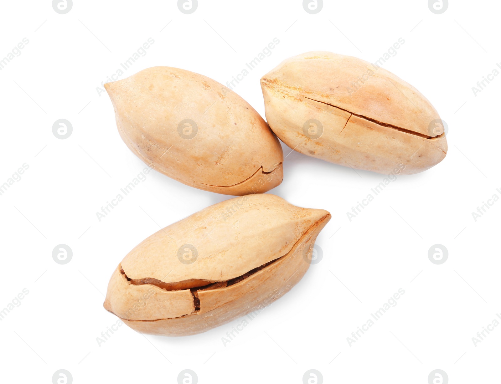 Photo of Pecan nuts in shell on white background, top view. Nutritive food