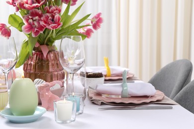 Photo of Festive table setting with beautiful flowers. Easter celebration