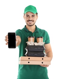 Young man holding orders and smartphone isolated on white, mockup for design. Online food delivery