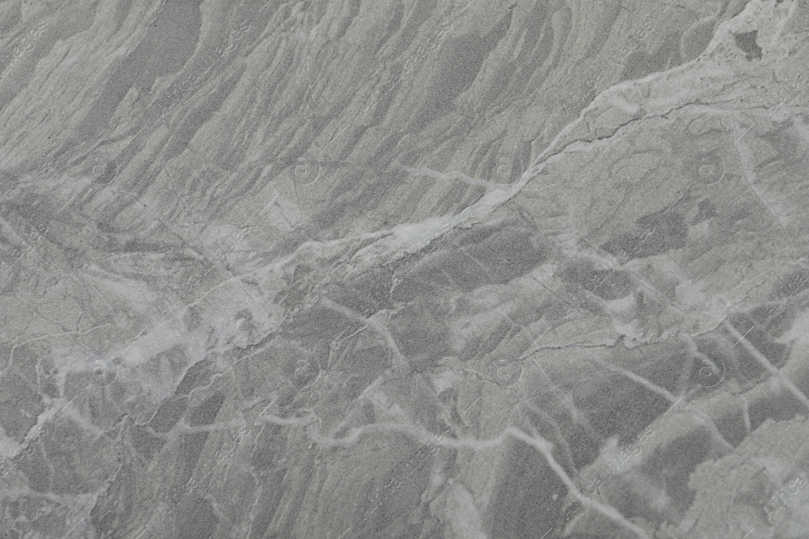 Photo of Texture of grey marble surface as background, closeup