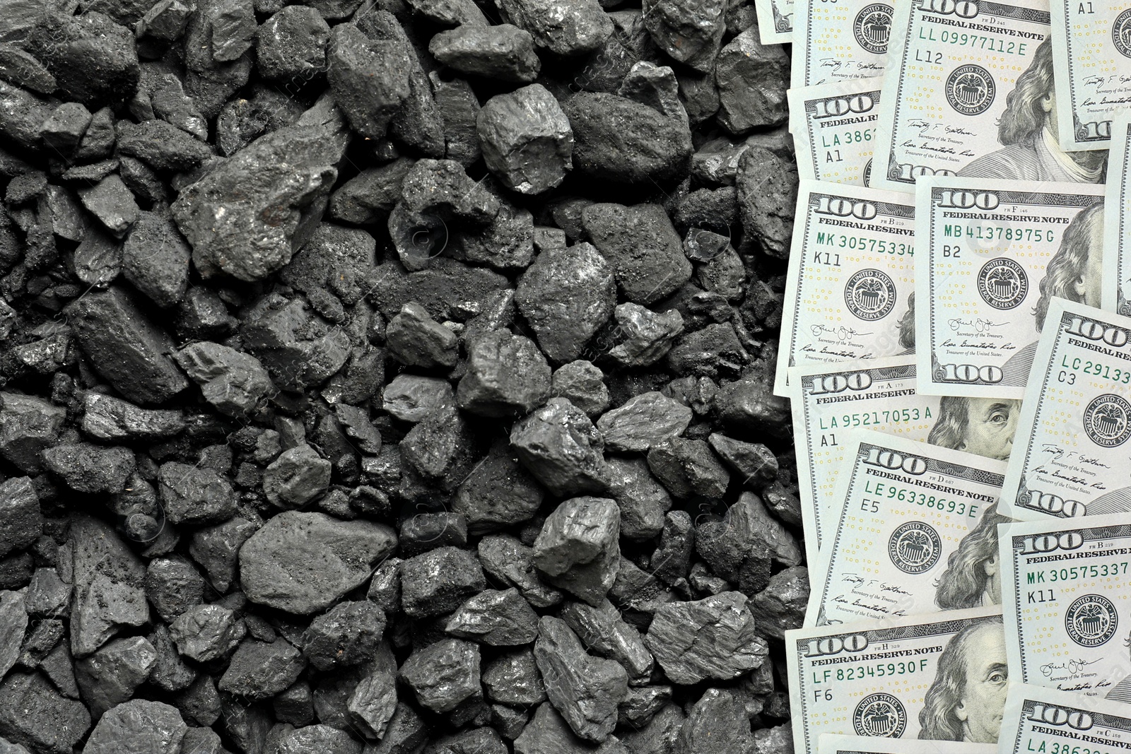 Image of Dollar banknotes on pieces of coal, top view. Resource price