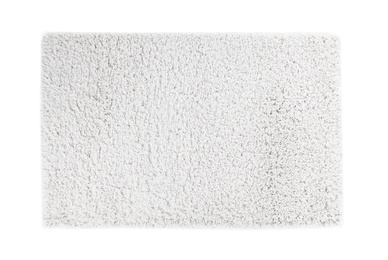 Photo of Fuzzy carpet on white background, top view. Interior element