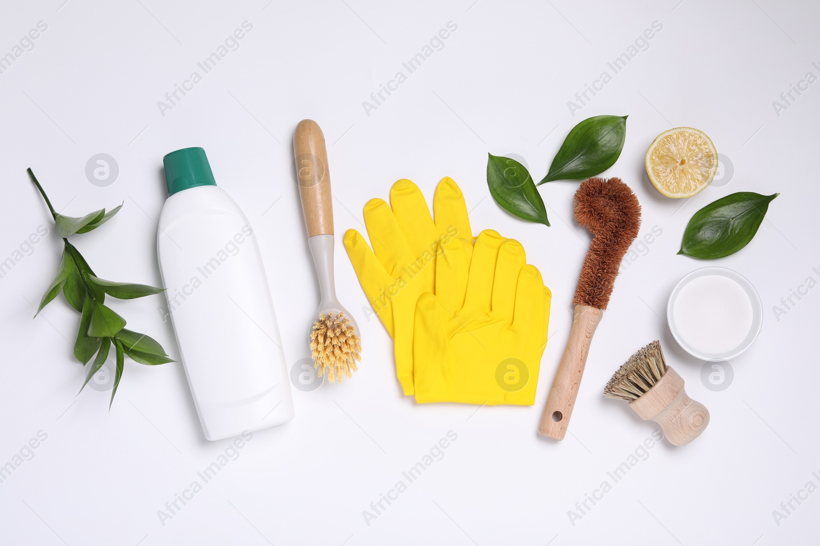 Photo of Flat lay composition with different cleaning supplies on white background