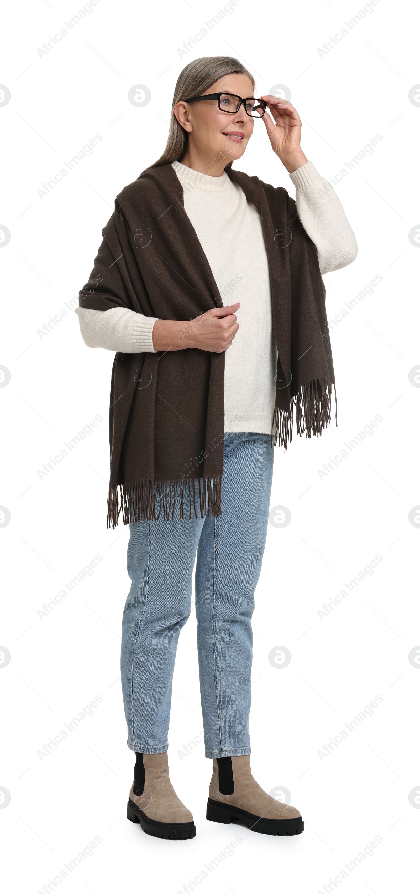 Photo of Full length portrait of senior woman on white background