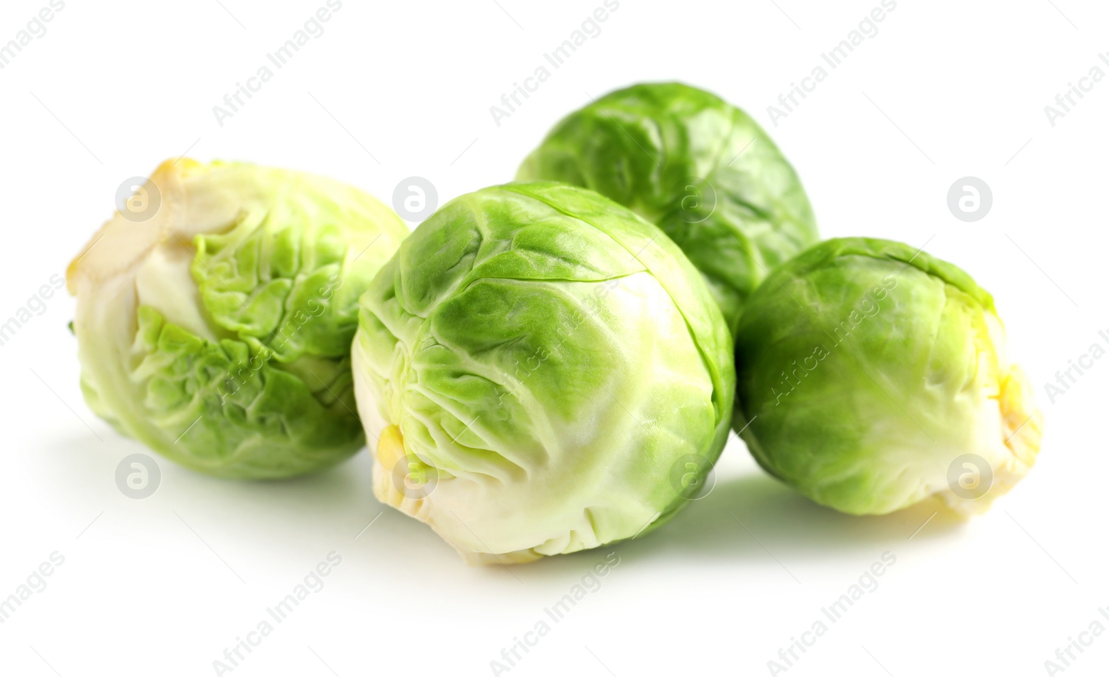 Photo of Fresh tasty Brussels sprouts on white background