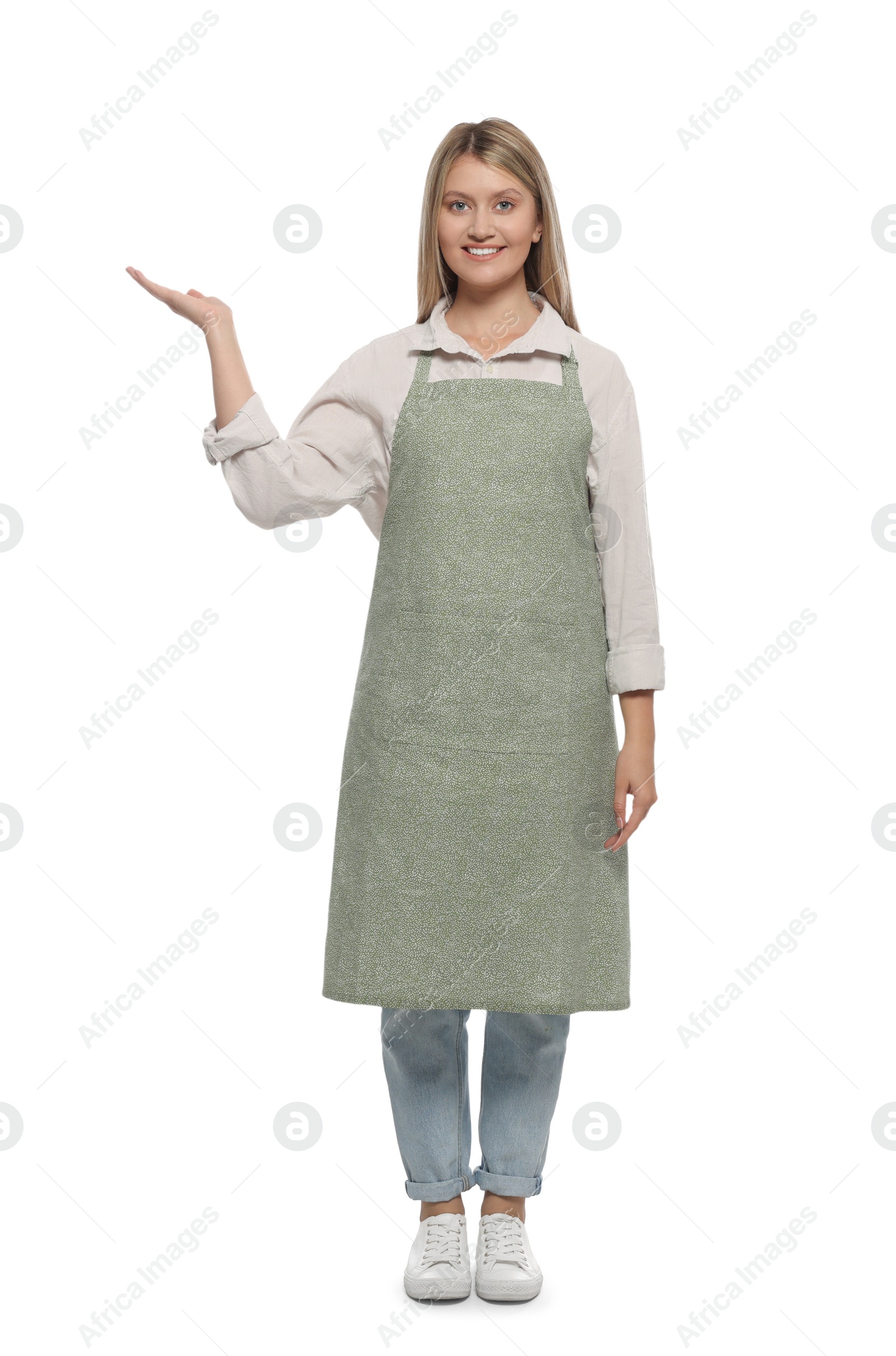 Photo of Beautiful young woman in clean apron on white background