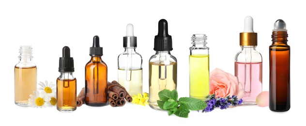 Image of Set of different essential oils used in aromatherapy on white background, banner design