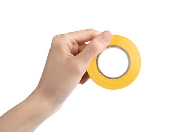 Photo of Woman holding yellow insulating tape on white background, closeup