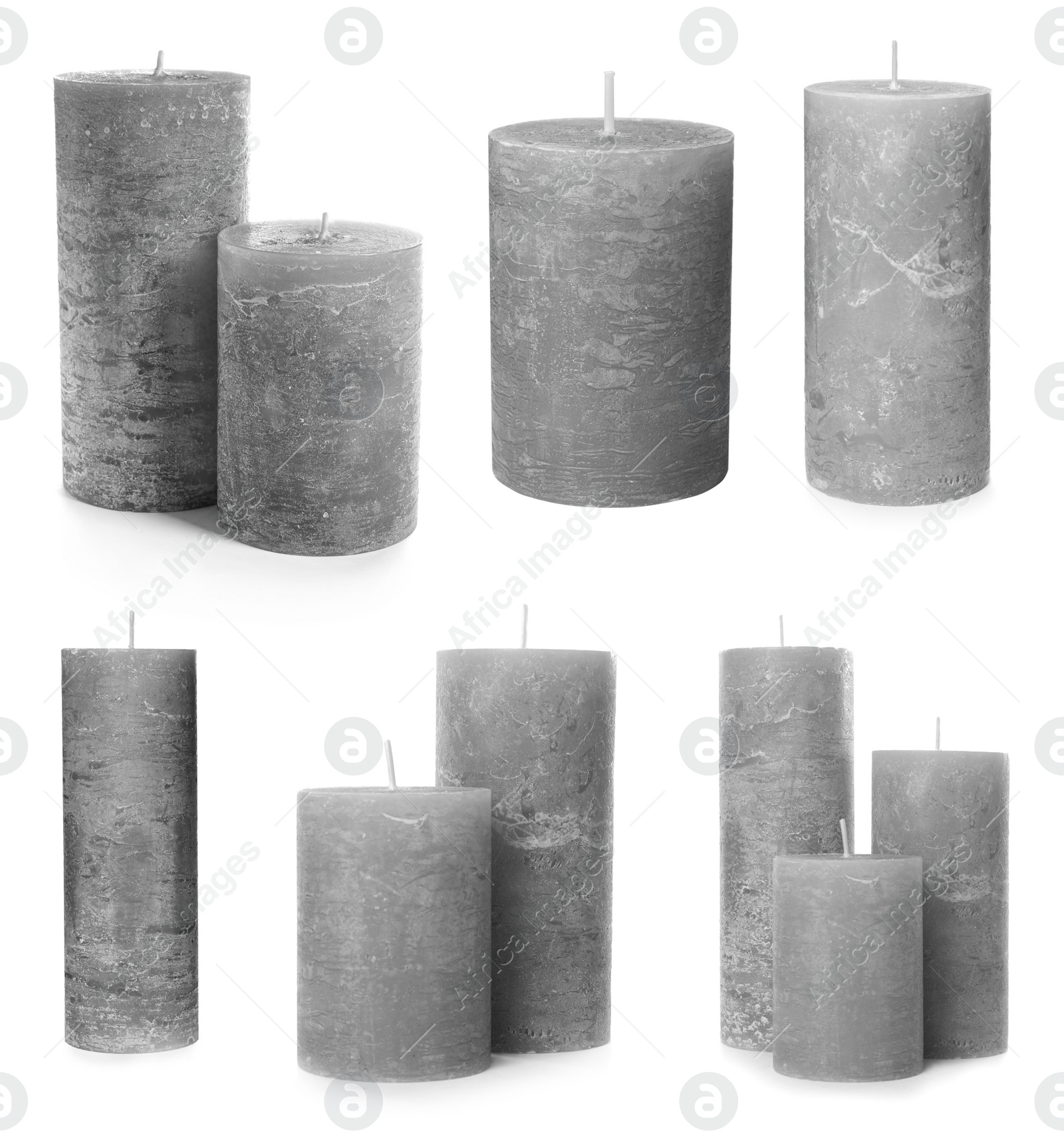 Image of Set of grey wax candles on white background