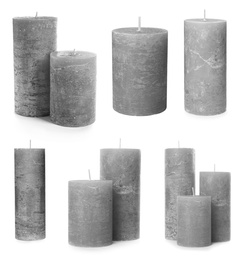 Image of Set of grey wax candles on white background