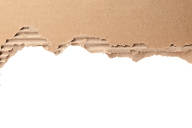 Torn cardboard on white background. Recyclable material