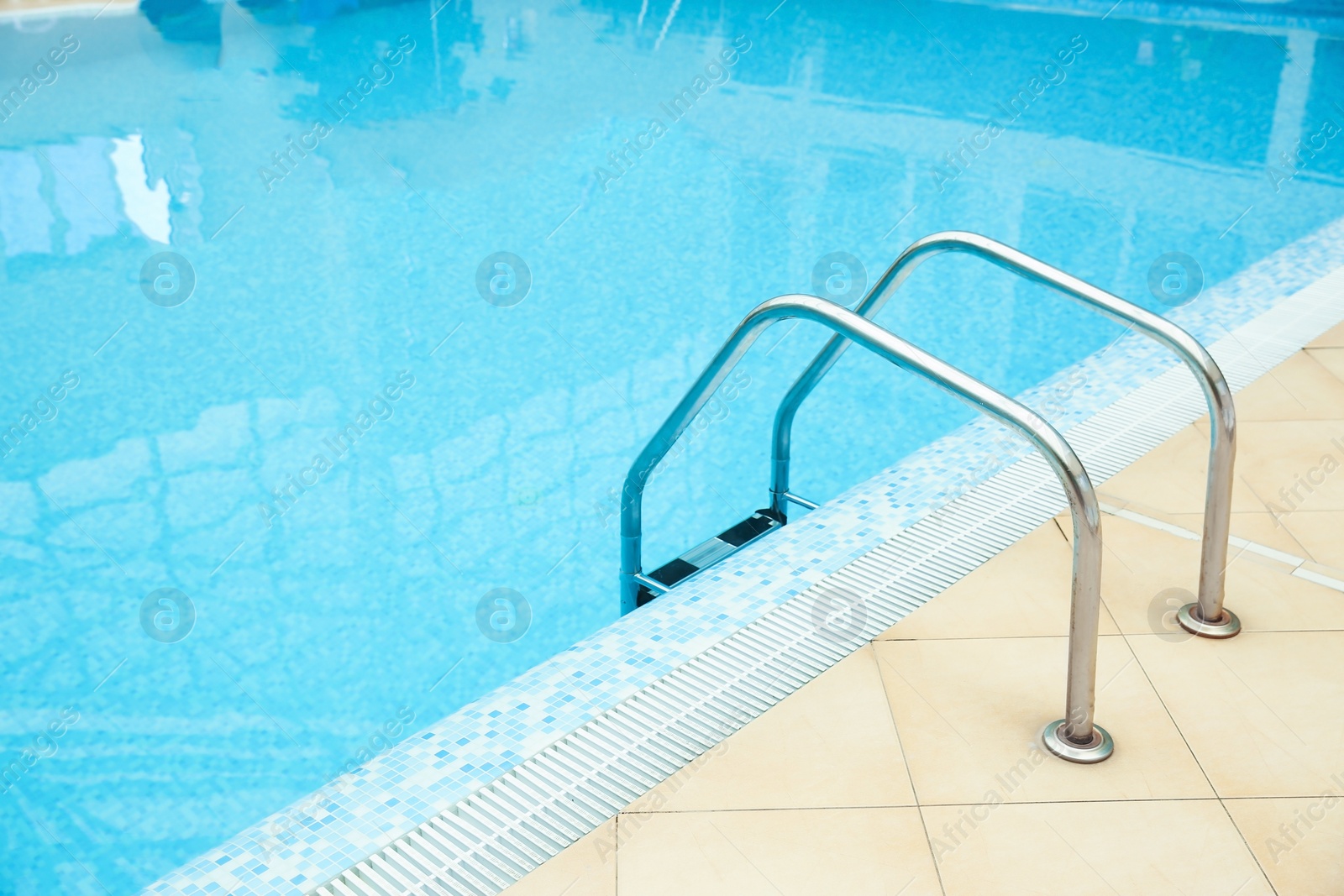 Photo of Ladder with grab bars in swimming pool